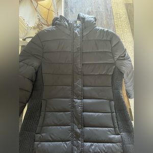 small black winter jacket with buttons  and zipper